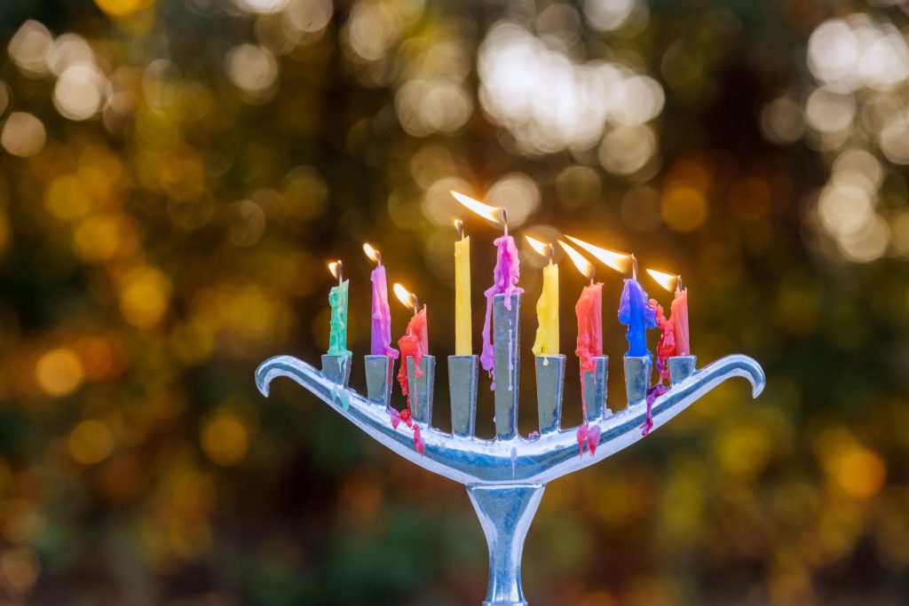 Religion of jewish holiday Hanukkah with menorah candelabra candles